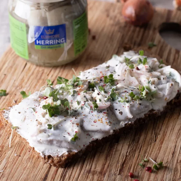 Elsinore - Dill herrings, Creme Fraiche, onions and pink peppercorns